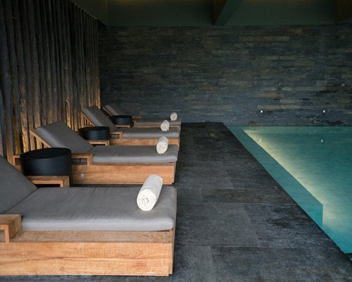 quiet relaxation area beside an indoor pool