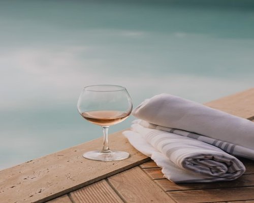 glass of water and towel in a calm wellness setting